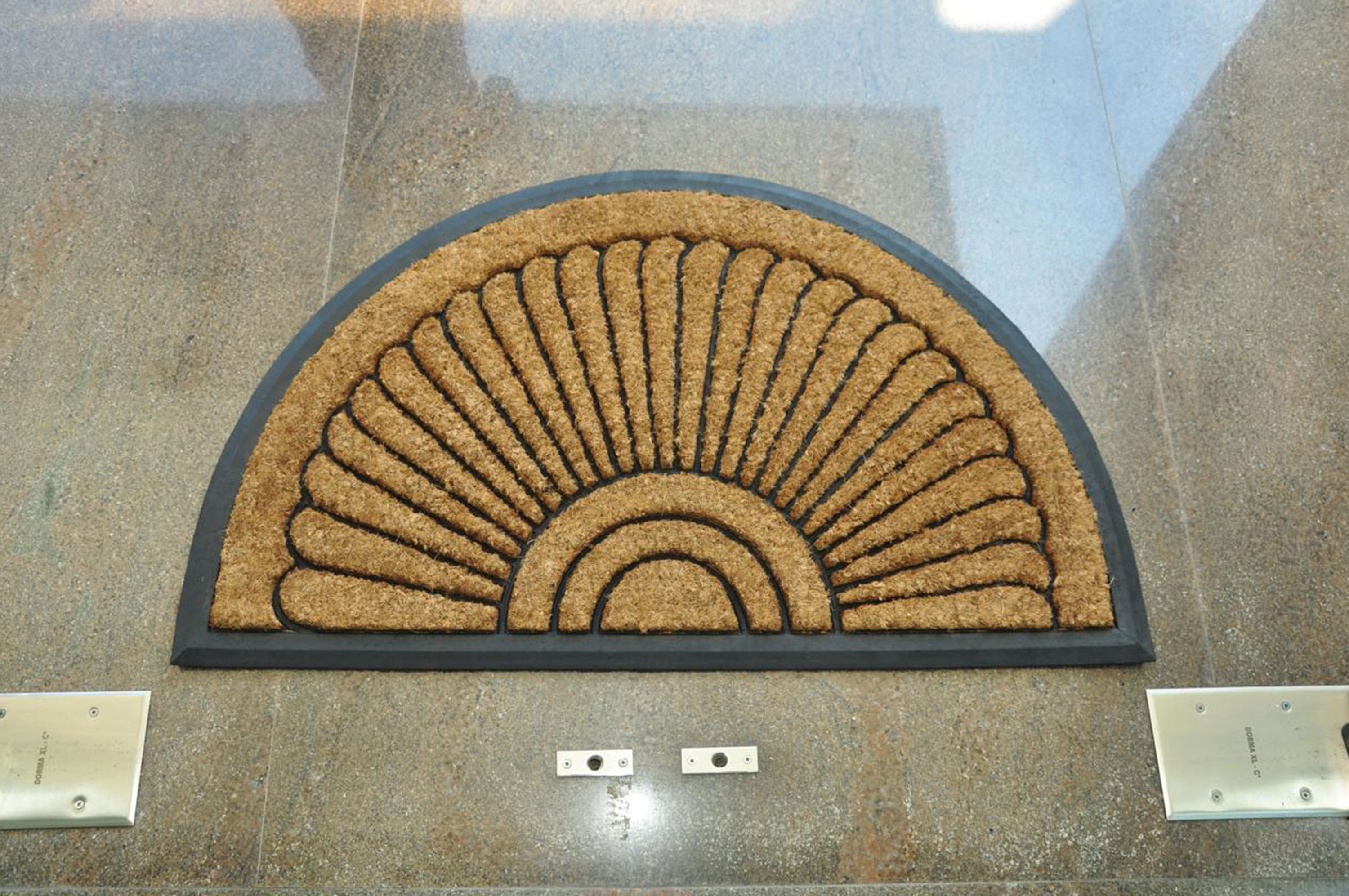 arch coco door mats on entrance