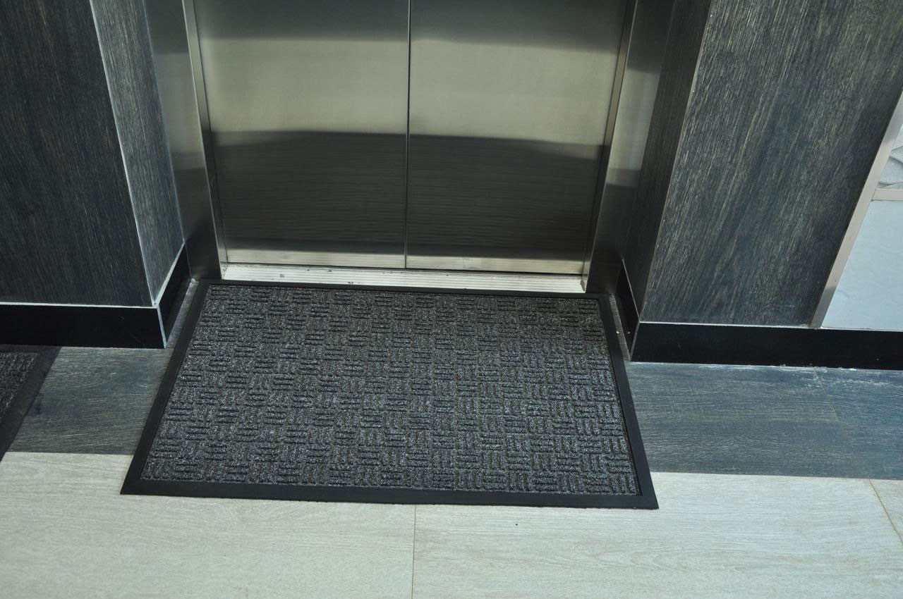 water absorbent mats on the elevator